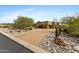 Long brick driveway leads to the home with desert landscaping at 3553 N Crystal Peak Cir, Mesa, AZ 85207