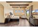 Relaxing main bedroom with wooden beams, decorative wall windows and beautiful desert views at 3553 N Crystal Peak Cir, Mesa, AZ 85207