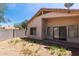Low maintenance backyard features a block wall and a covered patio, creating a serene outdoor space at 3834 W Commonwealth Ave, Chandler, AZ 85226