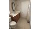Bathroom with a vanity and oval mirror at 4065 E University Dr # 4, Mesa, AZ 85205