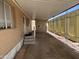Carport with a concrete floor and privacy fences at 4065 E University Dr # 4, Mesa, AZ 85205