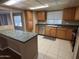 This kitchen has stainless appliances and light wood cabinets at 4065 E University Dr # 4, Mesa, AZ 85205