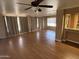 Bright living room featuring modern ceiling fan and plenty of natural light at 4065 E University Dr # 4, Mesa, AZ 85205