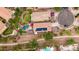Aerial view of the home showing the backyard pool and putting green in a cul-de-sac at 4152 S Bandit Ct, Gilbert, AZ 85297