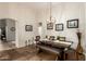 Cozy dining room with lots of light, wooden table and tile floor at 4152 S Bandit Ct, Gilbert, AZ 85297