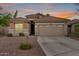 Charming single-story home with a well-maintained front yard and a neutral color palette at 4152 S Bandit Ct, Gilbert, AZ 85297