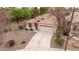 Charming single-Gathering home featuring desert landscaping, a tile roof, and a spacious two-car garage at 4152 S Bandit Ct, Gilbert, AZ 85297