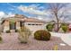 Cozy single-story home featuring desert landscaping and a two-car garage at 4152 S Bandit Ct, Gilbert, AZ 85297