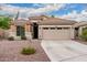 Charming single-story home with a well-maintained front yard and a neutral color palette at 4152 S Bandit Ct, Gilbert, AZ 85297
