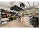 Spacious garage with epoxy floors, overhead storage, and access to a well-kept exterior at 4152 S Bandit Ct, Gilbert, AZ 85297