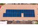 Roof of a single Gathering home featuring photovoltaic solar panels installed across the back of the property at 4152 S Bandit Ct, Gilbert, AZ 85297