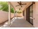 Covered back porch featuring concrete flooring and outdoor ceiling fans at 4201 W Renee Dr, Glendale, AZ 85308