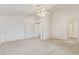 Bright bedroom with neutral carpeting and ample closet space at 4201 W Renee Dr, Glendale, AZ 85308