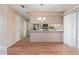 Dining area with wood floors, chandelier, and sliding glass door at 4201 W Renee Dr, Glendale, AZ 85308