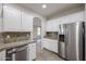 Clean kitchen design with granite counters, stainless steel appliances, and lots of storage space at 45633 W Mountain View Rd, Maricopa, AZ 85139