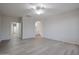 Spacious primary bedroom with a ceiling fan, neutral paint, and an ensuite bathroom at 45633 W Mountain View Rd, Maricopa, AZ 85139