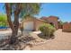 Charming single-story home with low maintenance desert landscaping and a two-car garage at 46123 W Sheridan Rd, Maricopa, AZ 85139