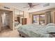 Bedroom featuring a sliding glass door leading to the patio and mirrored closet at 5215 W Onyx Ave, Glendale, AZ 85302