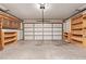 Spacious two car garage with shelving at 5215 W Onyx Ave, Glendale, AZ 85302
