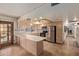 Well-lit kitchen with tile floors and stainless steel appliances at 5215 W Onyx Ave, Glendale, AZ 85302