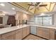 Bright kitchen featuring a breakfast bar and ample countertop space at 5215 W Onyx Ave, Glendale, AZ 85302
