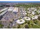 Panoramic aerial view showcasing proximity to shopping, golf course, covered parking, and residential options at 5221 N 24Th St # 103, Phoenix, AZ 85016