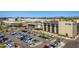 High-angle view of a vibrant shopping area with varied stores and restaurants, including a Life Time fitness center at 5221 N 24Th St # 103, Phoenix, AZ 85016