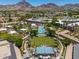 Expansive aerial view showcasing the resort, surrounding landscape, and mountain views at 5221 N 24Th St # 103, Phoenix, AZ 85016