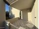 A covered balcony features patterned tile and a door to the interior at 5221 N 24Th St # 103, Phoenix, AZ 85016