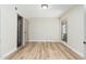 Light and airy bedroom featuring modern floors, a view to the outdoors, and closet space at 5221 N 24Th St # 103, Phoenix, AZ 85016