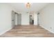 Light-filled bedroom with wood flooring, an overhead light, and neutral walls ready for personalization at 5221 N 24Th St # 103, Phoenix, AZ 85016