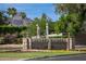 Landscaped entrance to Arizona Biltmore features elegant stonework and mountain views at 5221 N 24Th St # 103, Phoenix, AZ 85016