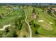Aerial view of a well-maintained golf course with lush green fairways and scenic landscaping at 5221 N 24Th St # 103, Phoenix, AZ 85016
