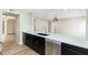 Modern kitchen with stainless steel appliances, sleek countertops, and modern fixtures at 5221 N 24Th St # 103, Phoenix, AZ 85016