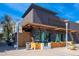 Bisutoro Sushi Bar + Grill features a modern exterior with covered patio and sleek design at 5221 N 24Th St # 103, Phoenix, AZ 85016