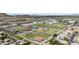 Community aerial view featuring a baseball field, football field, and nearby homes at 5423 W Michigan Ave, Glendale, AZ 85308