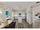 Well-lit kitchen featuring white cabinets, granite countertops and stainless steel appliances at 5423 W Michigan Ave, Glendale, AZ 85308