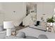 Bright, open-concept living area with high ceilings, modern furniture, and stylish décor at 5423 W Michigan Ave, Glendale, AZ 85308
