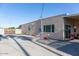 Wide backyard view highlighting the covered patio and generous outdoor space for various activities at 546 S Ellsworth Rd, Mesa, AZ 85208