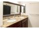 Bathroom featuring double sinks, granite counters, and ample space at 546 S Ellsworth Rd, Mesa, AZ 85208