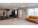 Bright bonus room featuring home gym equipment and seating at 546 S Ellsworth Rd, Mesa, AZ 85208
