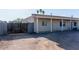 Exterior view featuring a private gated yard, spacious lot, and well-maintained landscaping at 546 S Ellsworth Rd, Mesa, AZ 85208