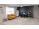 Inviting living room features modern décor, plush seating, and a stylish piano area at 546 S Ellsworth Rd, Mesa, AZ 85208
