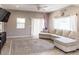 Comfortable living room featuring a sectional sofa and natural light at 546 S Ellsworth Rd, Mesa, AZ 85208