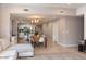Open-concept living space with kitchen, dining, and living areas, great for entertaining at 546 S Ellsworth Rd, Mesa, AZ 85208