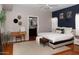 Cozy main bedroom with ensuite bath, walk-in closet, and stylish décor at 546 S Ellsworth Rd, Mesa, AZ 85208