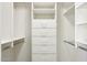 Spacious closet with built-in shelves and drawers to maximize organization and storage at 7204 W Mcrae Way, Glendale, AZ 85308
