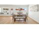 Bright dining room with an oversized window overlooking the backyard and pool at 7204 W Mcrae Way, Glendale, AZ 85308
