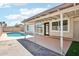 Covered patio with the pool in view at 7204 W Mcrae Way, Glendale, AZ 85308