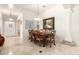 Elegant dining room showcasing a wooden table with seating for eight at 7804 S 15Th Ave, Phoenix, AZ 85041